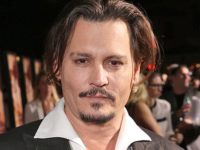 Johnny Depp o acuză pe Amber Heard că s-a prezentat în instanţă cu „vânătăi desenate”