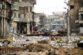 Cars burnt and destroyed by clashes are seen on a street during a battle between Iraqi forces and Islamic State militants, in Mosul