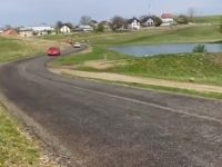 Un drum a fost acoperit cu asfalt „depozitat” temporar
