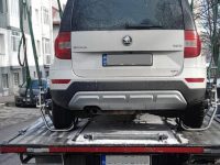 Maşină ridicată pentru neplata parcării