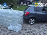 Două autoturisme şi aproape 8 tone de alcool au fost confiscate de poliţişti